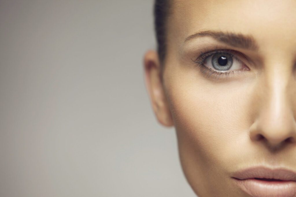 right side of female face with brown hair